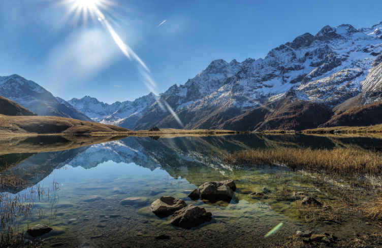 A soothing Lake and misty mountain wall mural.