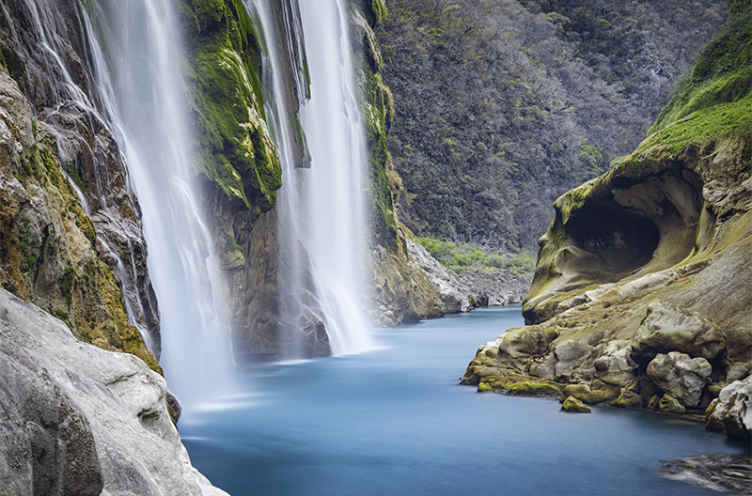 Wall mural waterfall serene waterfall view - TenStickers