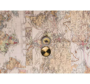 This vintage world map wall mural shows an old map of the world with a golden compass in the middle The photo is so good, it looks like it's real!