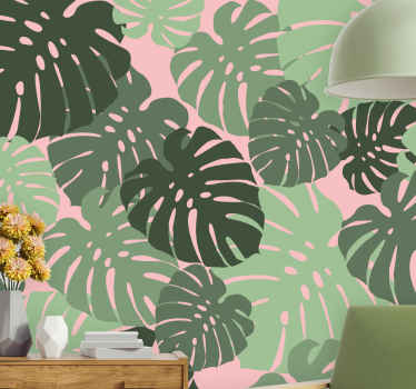 Monstera leaves pink color living room mural - TenStickers