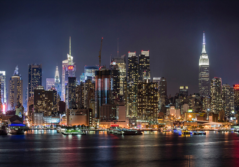Fototapete Städte New York Skyline bei Nacht - TenStickers