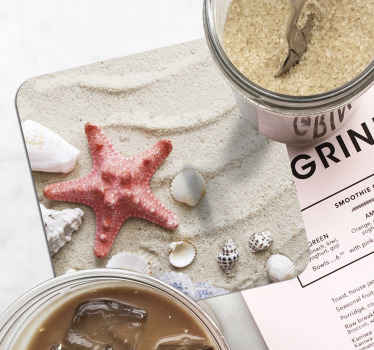 Meritähti ja kuoret hiekkarannikolla - Tenstickers