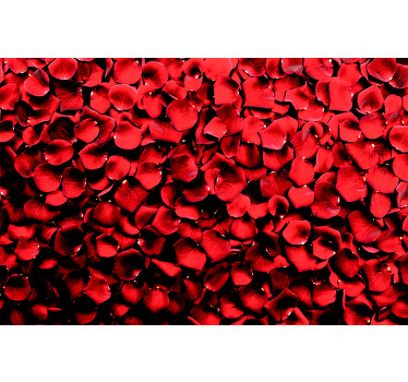 Rose canvas print which features an image of a pile of rose petals all coloured in a brilliant shade of red. High quality.