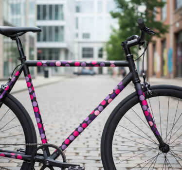 Bike sticker in purple and pink dots - TenStickers