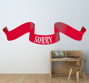 A red ribbon wall sticker with the text 'sorry'. Great text decal to decorate your home and apologise to someone.