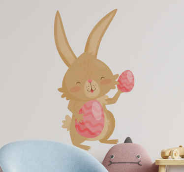 Påskehare som holder rosa eggveggklistremerke - Tenstickers
