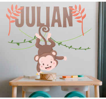 Adesivos de animais Bebê macaco fofo pendurado no galho - TenStickers