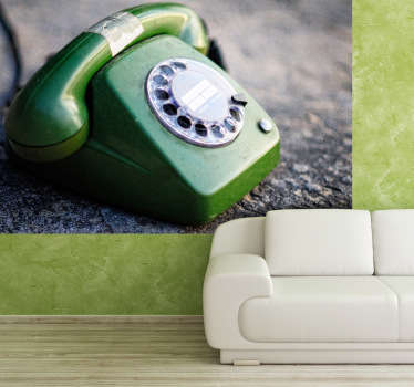 Vinil decorativo de um fotomural autocolante de um telefone antigo de cor verde. Adesivo de parede paar decoração de interiores.