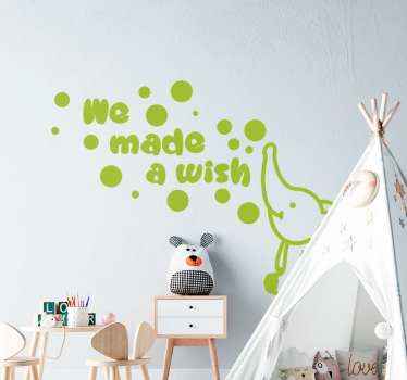Vinil decorativo simples para quarto de criança com o desenho de um elefante bebê e o texto que diz '' nós fizemos um desejo ''.