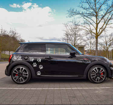 Adesivo per auto con impronte di cane - TenStickers