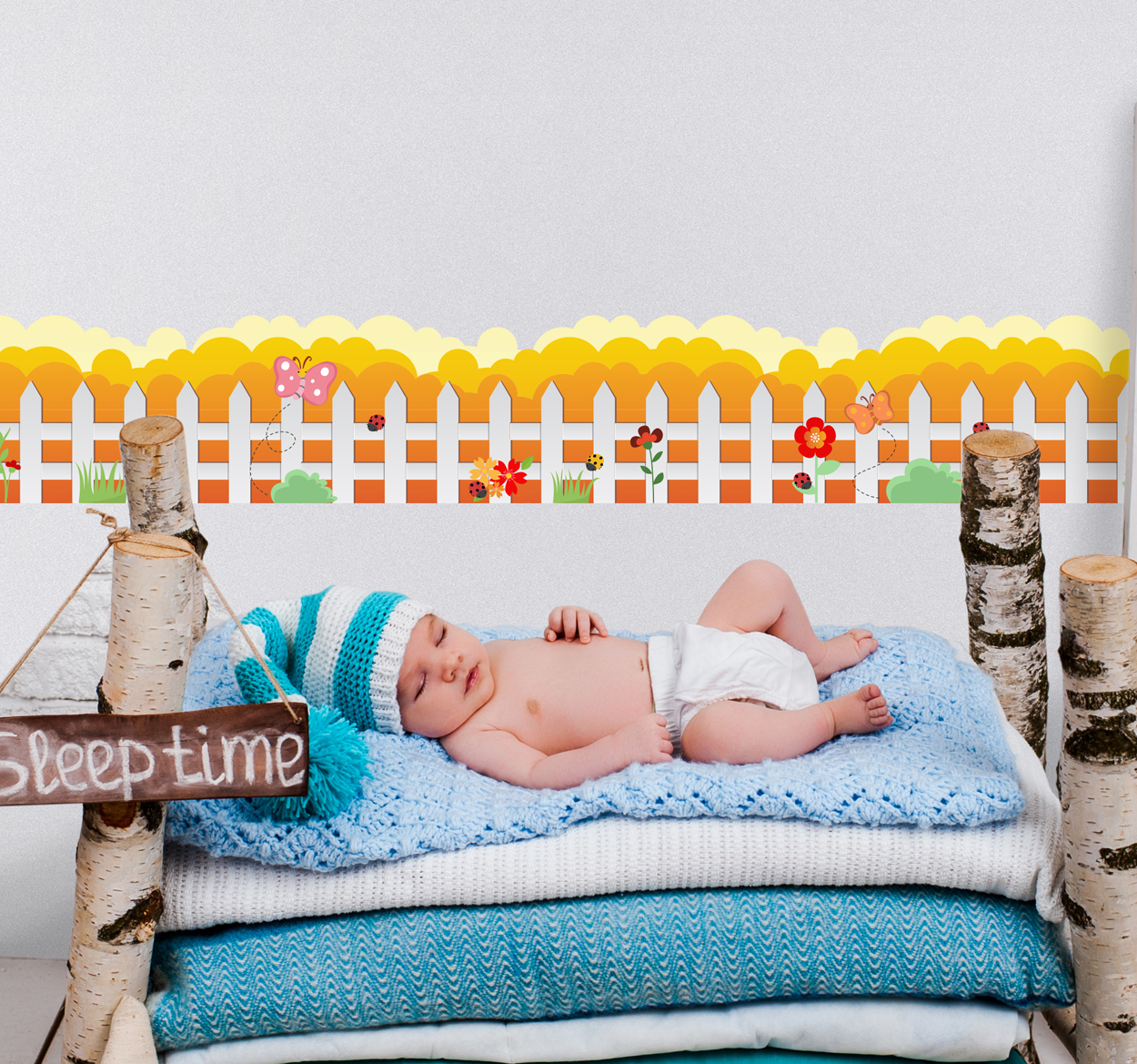 Tenstickers Muursticker sierrand hek met bloemen