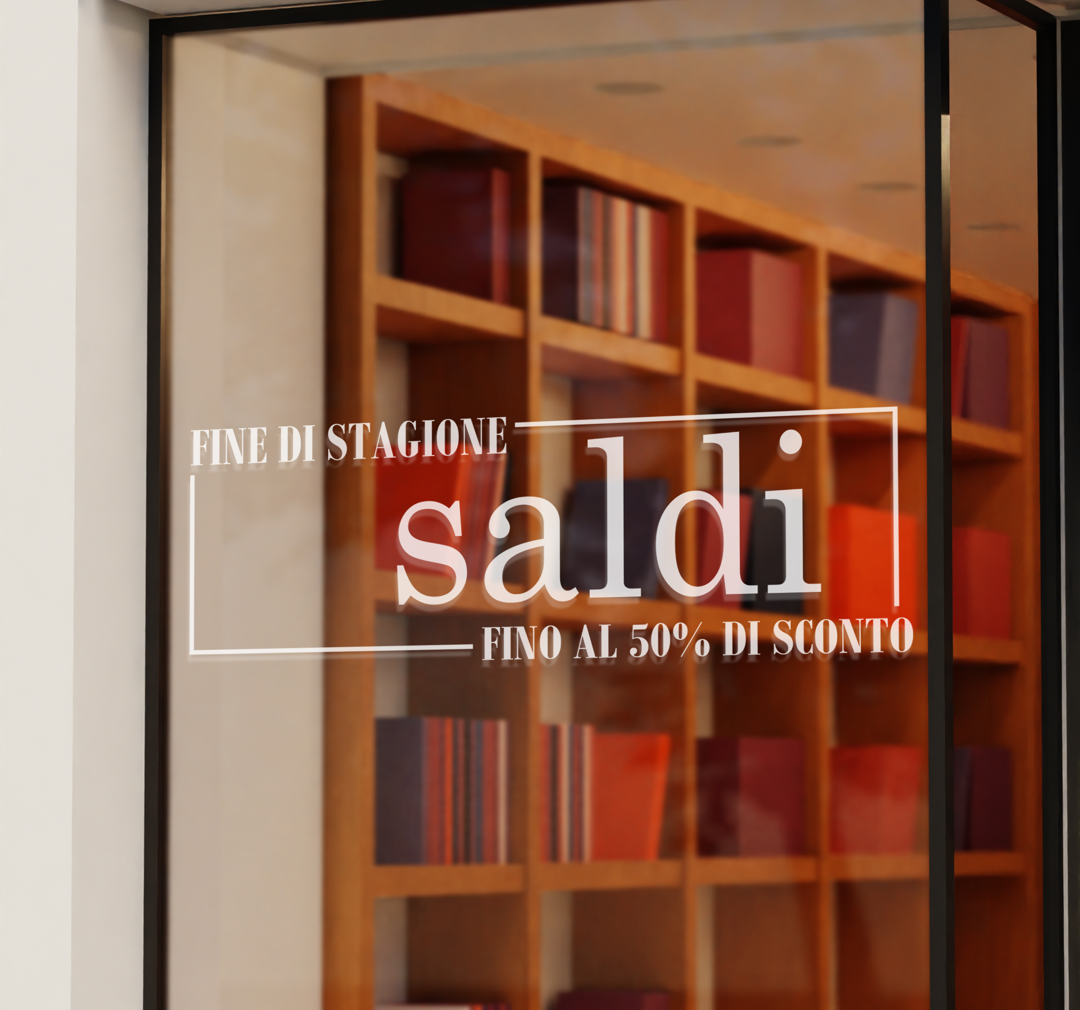 Vetrofanie saldi con scritta "saldi" fino al..