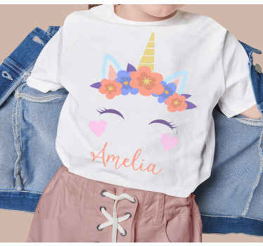 Unicorn pattern with name Kids t-shirt - TenStickers