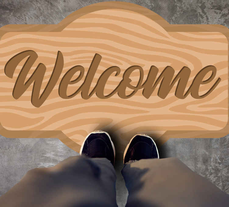 Tapis vinyle citation Phrase bienvenue sur un panneau - TenStickers