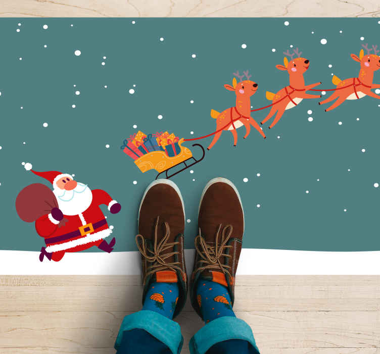 Santa stratil vianočný vinylový koberec na saniach - Tenstickers