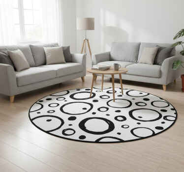 Geometric vinyl rug in black and white circular design - TenStickers