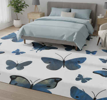 Tapis vinyle blanc ailes de papillon pailletées bleues - TenStickers