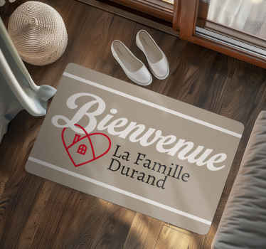 Tapis vinyle entrée bienvenue nom de famille avec coeur - TenStickers