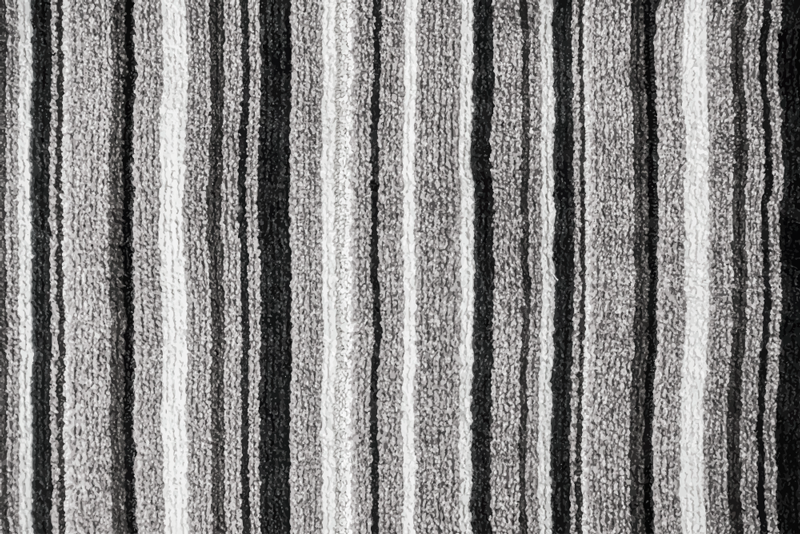 элегантный ковер с текстурой в черно-серых тонах - TenStickers