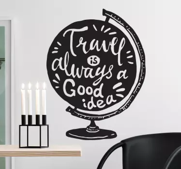 On this very special text wall sticker the profile of a globe is drawn with the English text "travel is always a good idea".