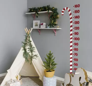 An amazing design to thrill children as Christmas decoration. The  design is a big candy  stick  with number calibration like a height chart.