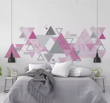 An amazing home wall decorative sticker that you can use as a bedroom headboard. It contains different geometric triangles in pink and grey colours.