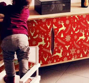 Christmas Sticker which features a pattern of Christmas themed objects including: holly, reindeers, snowflakes and Christmas trees.