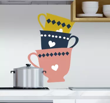 3 stacked tea cups drink decal in yellow, black and nude colour.  It is suitable for a kitchen or dinning space. Easy to apply and of high quality.