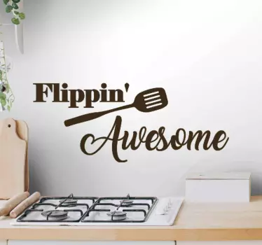 A kitchen utensil vinyl decal for your kitchen wall decoration. The design is a flippin spoon with the text inscribed ''Flipping awesome''.