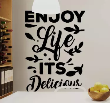 Text quote sticker for home decoration. The text reads ''Enjoy life its delicious''. This text vinyl decal is printed together with other features.