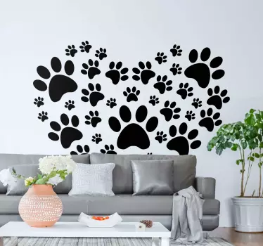 Animal footprint wall sticker that depicts the foot of dog. The collection of footprints is assembled to form a heart shape.