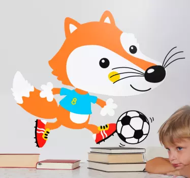 Kids room Wall Sticker with the design of a fox playing with a soccer ball, ideal to give a tender and unique touch to the decoration.
