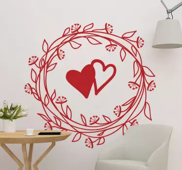 A leave wreath and heart wall decal with customizable colour options. It can be applied on any flat surface and it is durable.