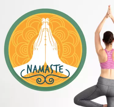 Yoga wall sticker which features the text 'Namaste' with an image of two hands together and a mandala floral background.