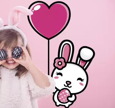 Cute cartoon Easter bunny holding egg and balloon decal - You would be changing the atmosphere on a kid's space greatly with this fun design.