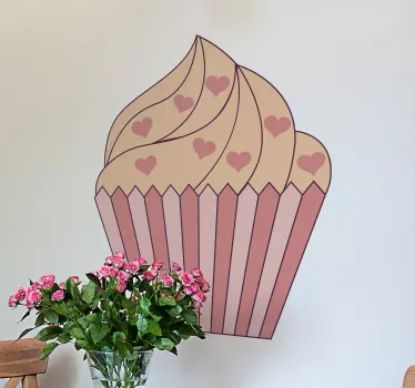 Cupcake wall sticker which It features a cute image of a cupcake covered in heart sprinkles. The design is coloured in shades of pink and peach!