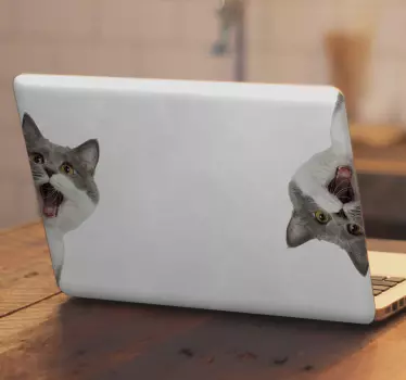 Lovely and cute decorative laptop decal design with plain white background with cats spying from the sides. The decal is original and durable.