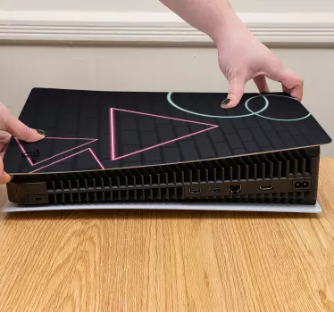 A very simple decorative PlayStation skin wrap decal design of a black textured background with neon geometric patterns.