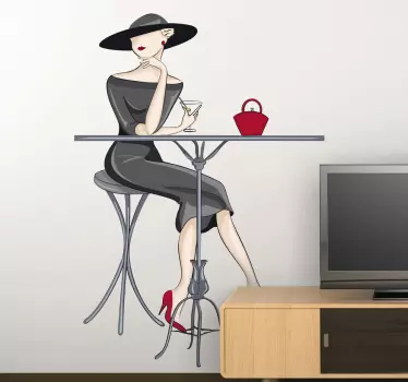 Elegant wall sticker of a woman sat at a table drinking a cocktail, perfect for decorating your living room, kitchen or cafe. Available in any size you want and leaving no sticky residue when removed.