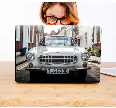 Volvo P1800 vinyl laptop skins. Detailed volo car with city background. Decorate your table. Get it with immediate shipping!