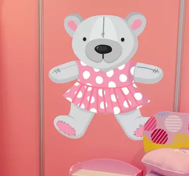 An adorable teddy bear in a pink polka dot dress from our teddy bear wall stickers collection to decorate a girl's bedroom or play area.