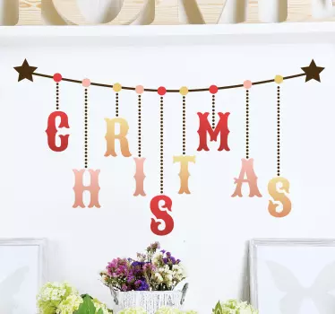 This Christmas banner wall sticker consists of the words "Christmas" spelt across a line, with stars on either end. Easy to apply and removable.