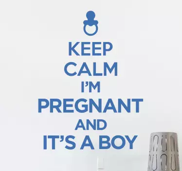 The wall sticker consists of the phrase “Keep calm, I’m pregnant and it’s a boy!’ written in a bold font.